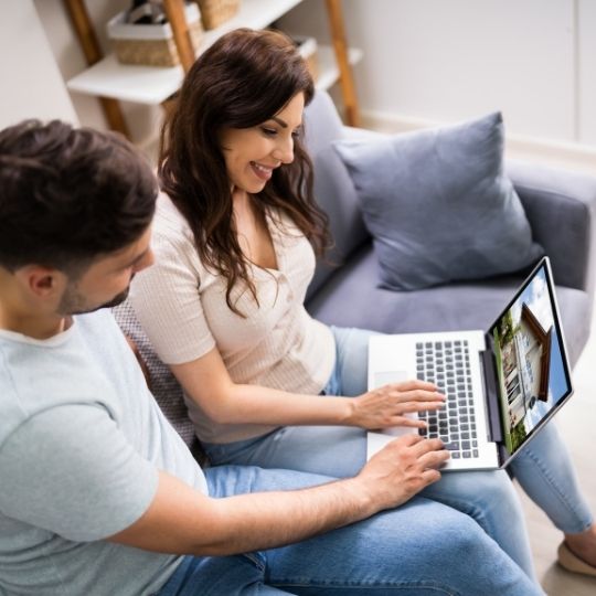 Couple looking at house